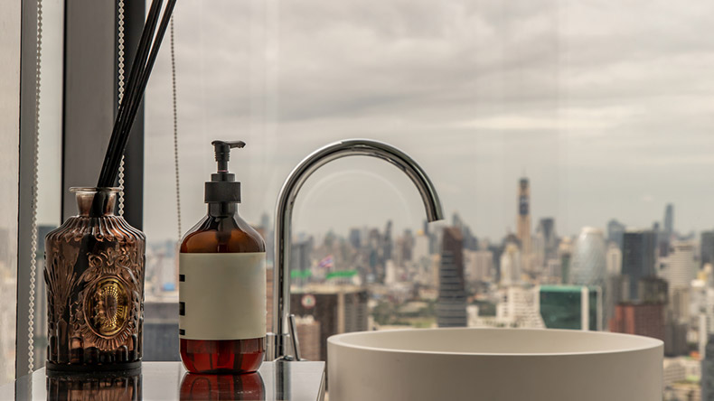 bathroom basin with a city view