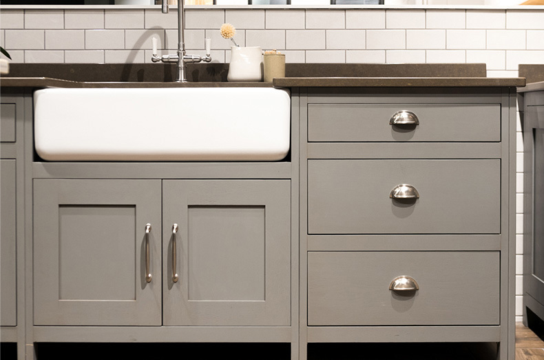 white kitchen sink grey cabinets#